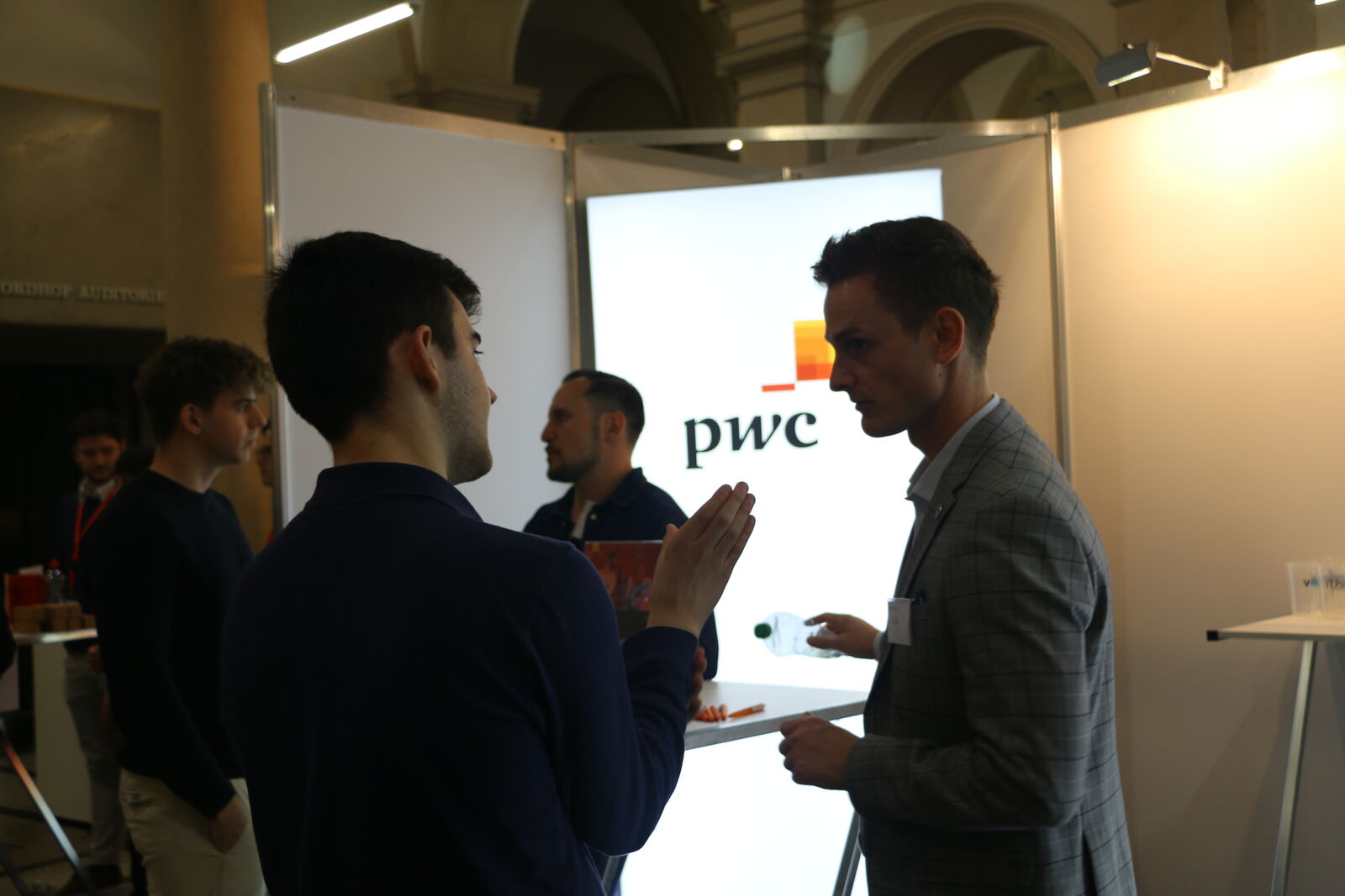 Students talking to a company representative