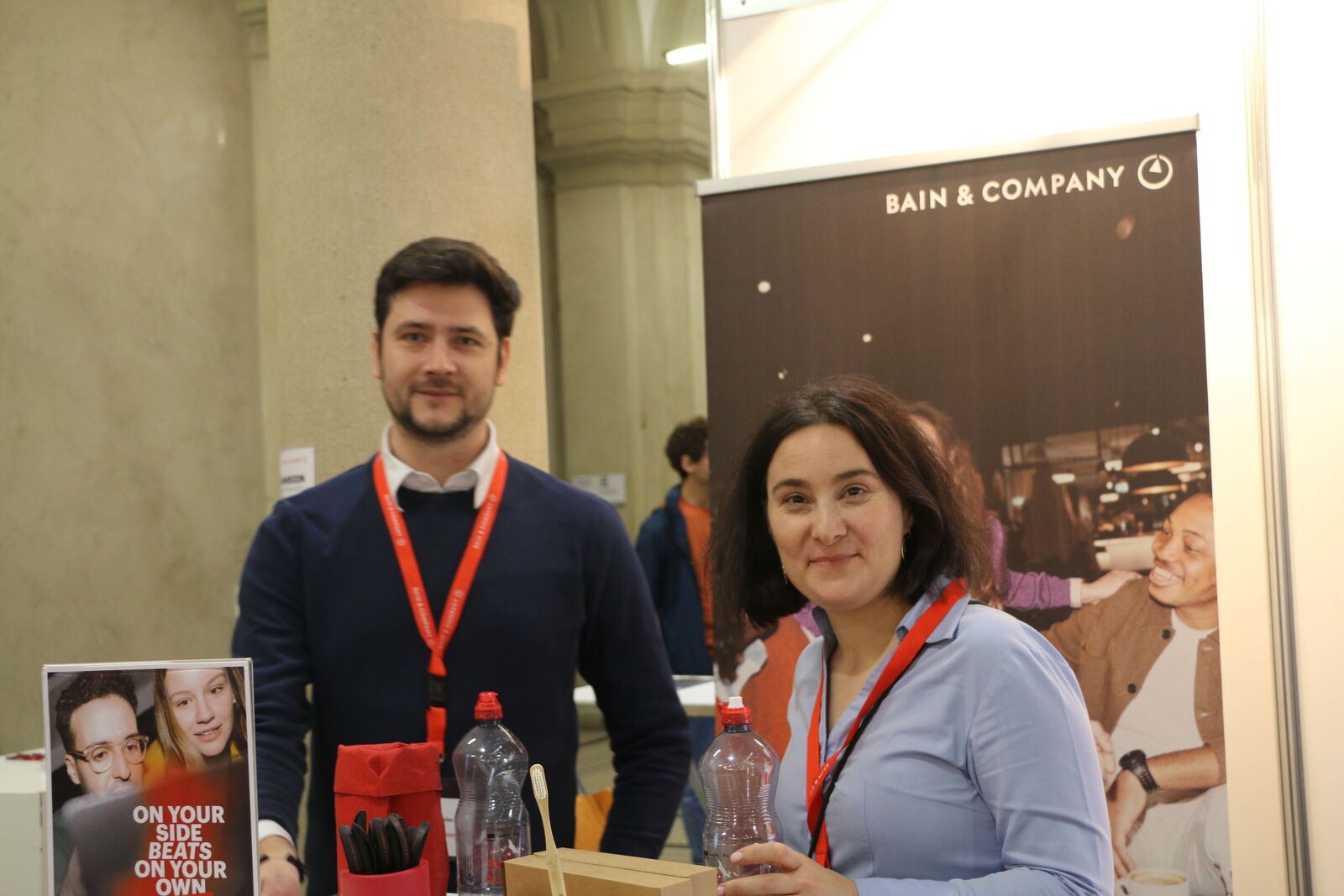 Two representatives at their booth