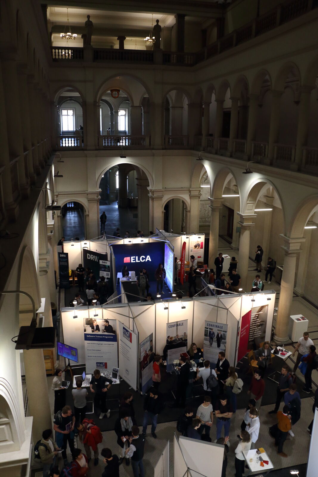 Booths under the arches of the main hall