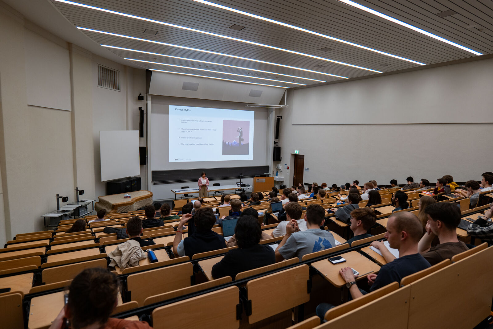 A full lecture hall during a company talk