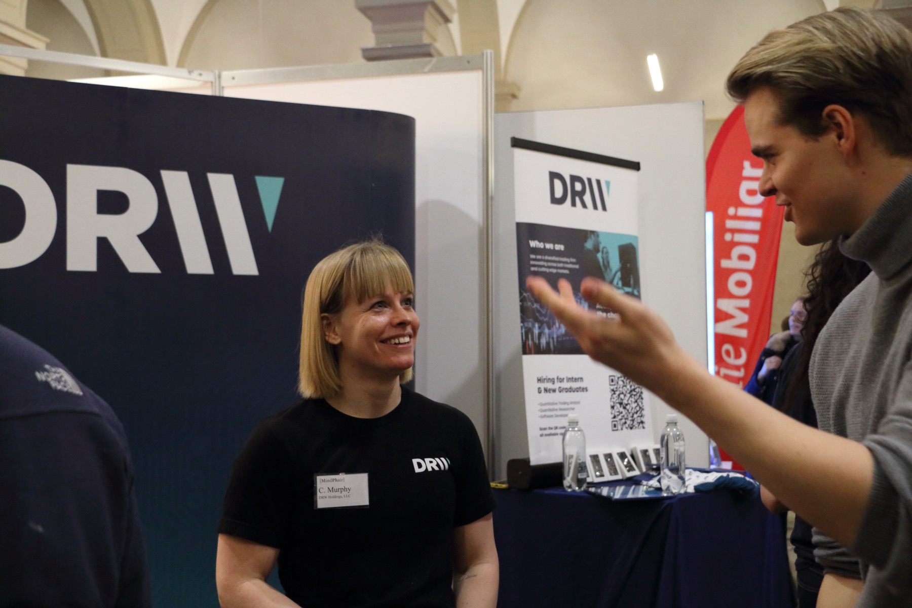 A DRW representative explaining something to students