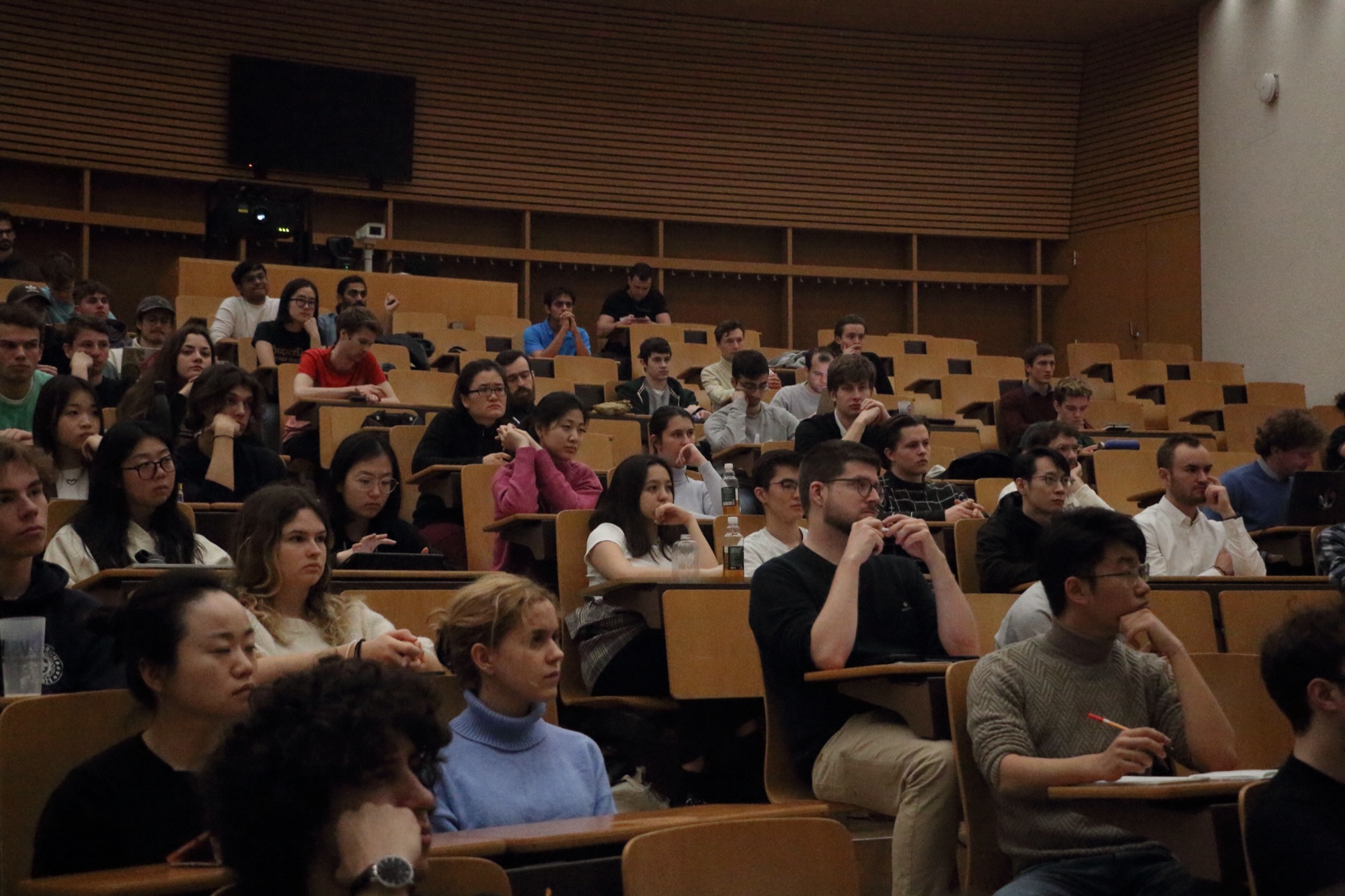 A full lecture hall during a company talk